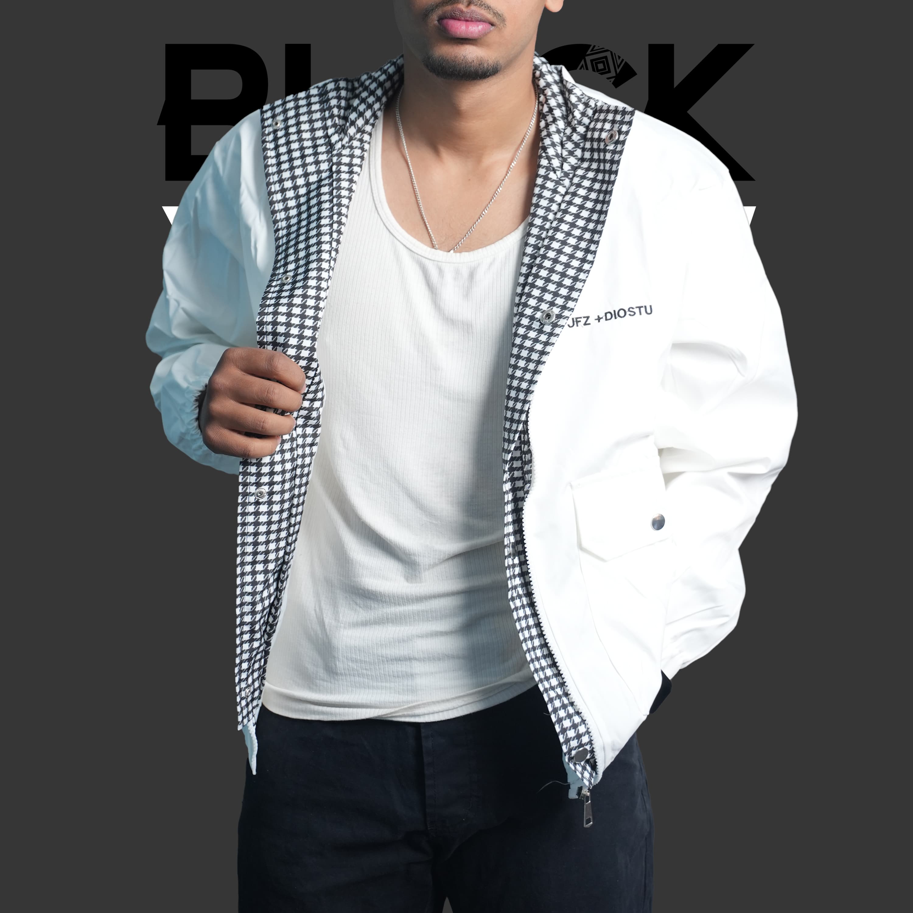 Man in black t-shirt using phone